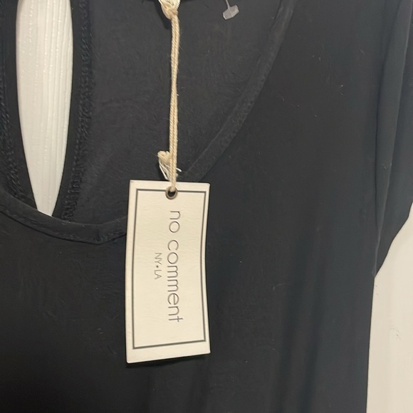 Never wore it, it’s still new. It’s been sitting in my closet for awhile - Picture 2 of 2